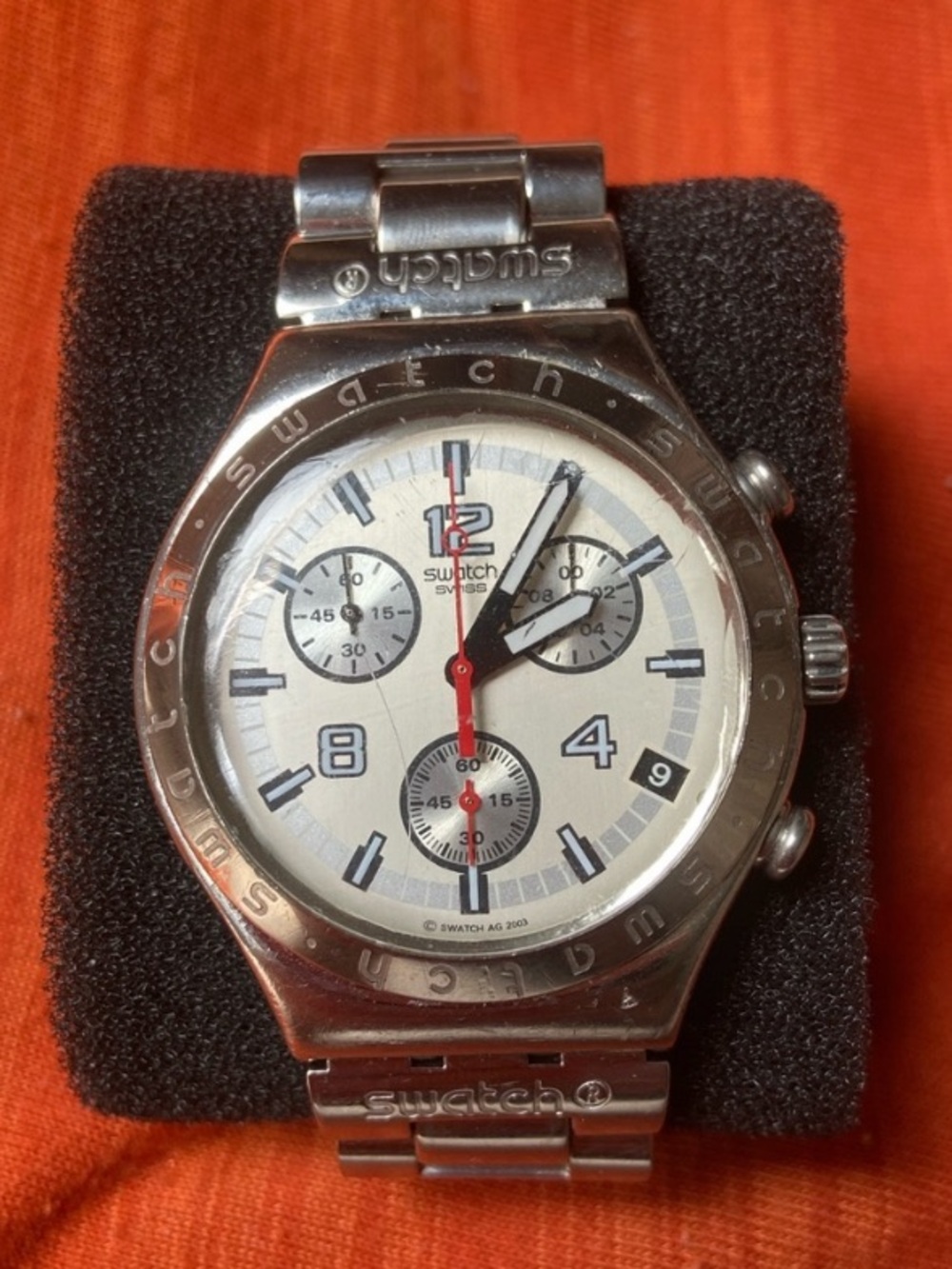 Swatch Silver Stainless Steel Chronograph Watch with White Dial and Red Hand
